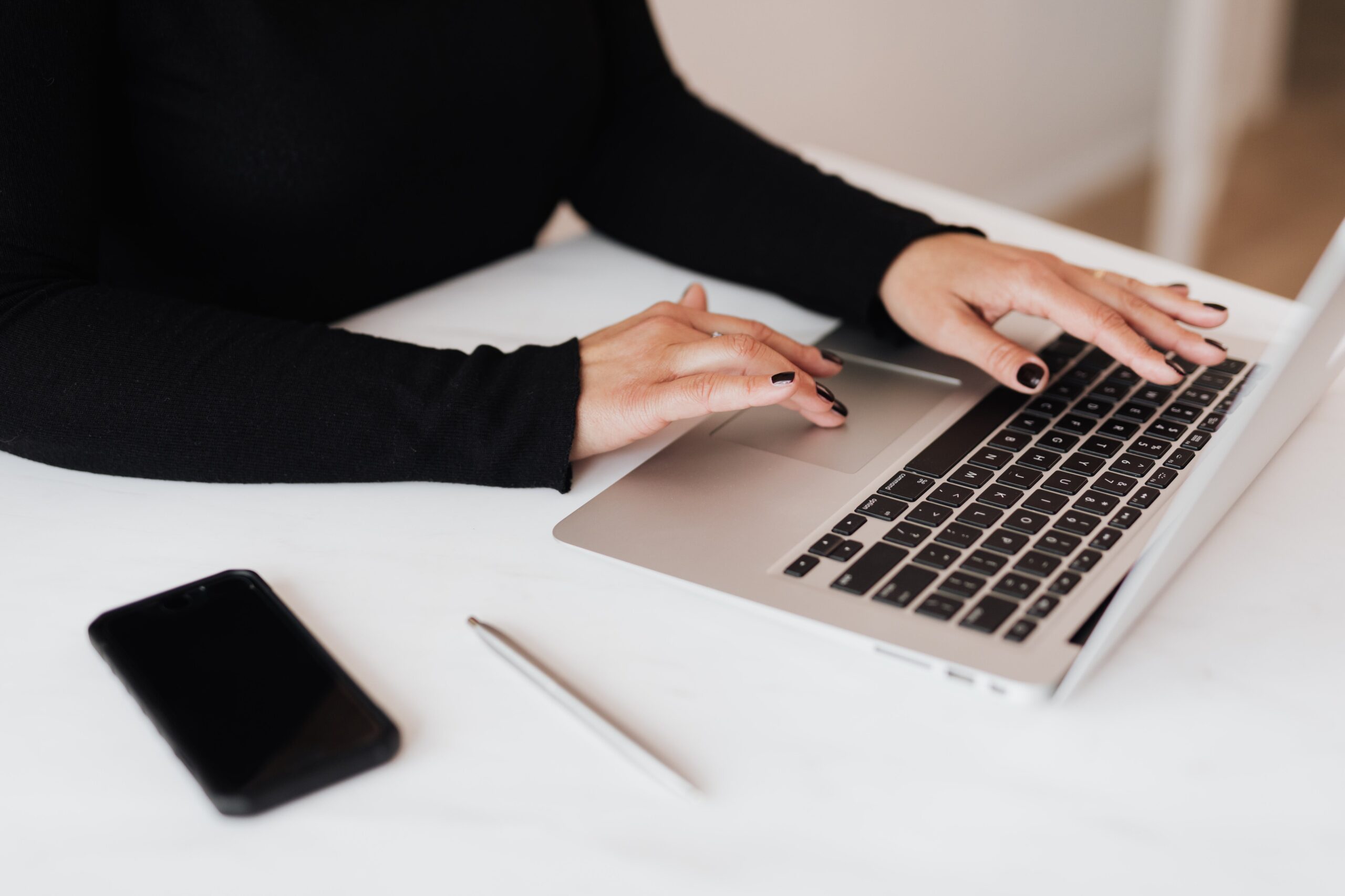 Women searching for required items for branch office registration in Japan