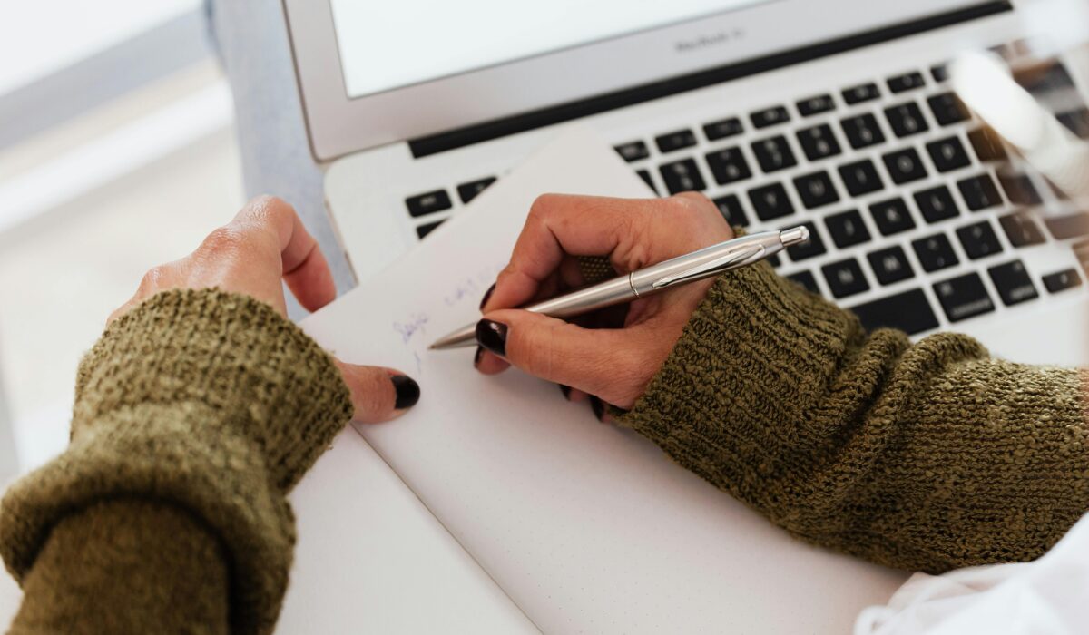 Woman preparing documents for her visa renewal application in Japan